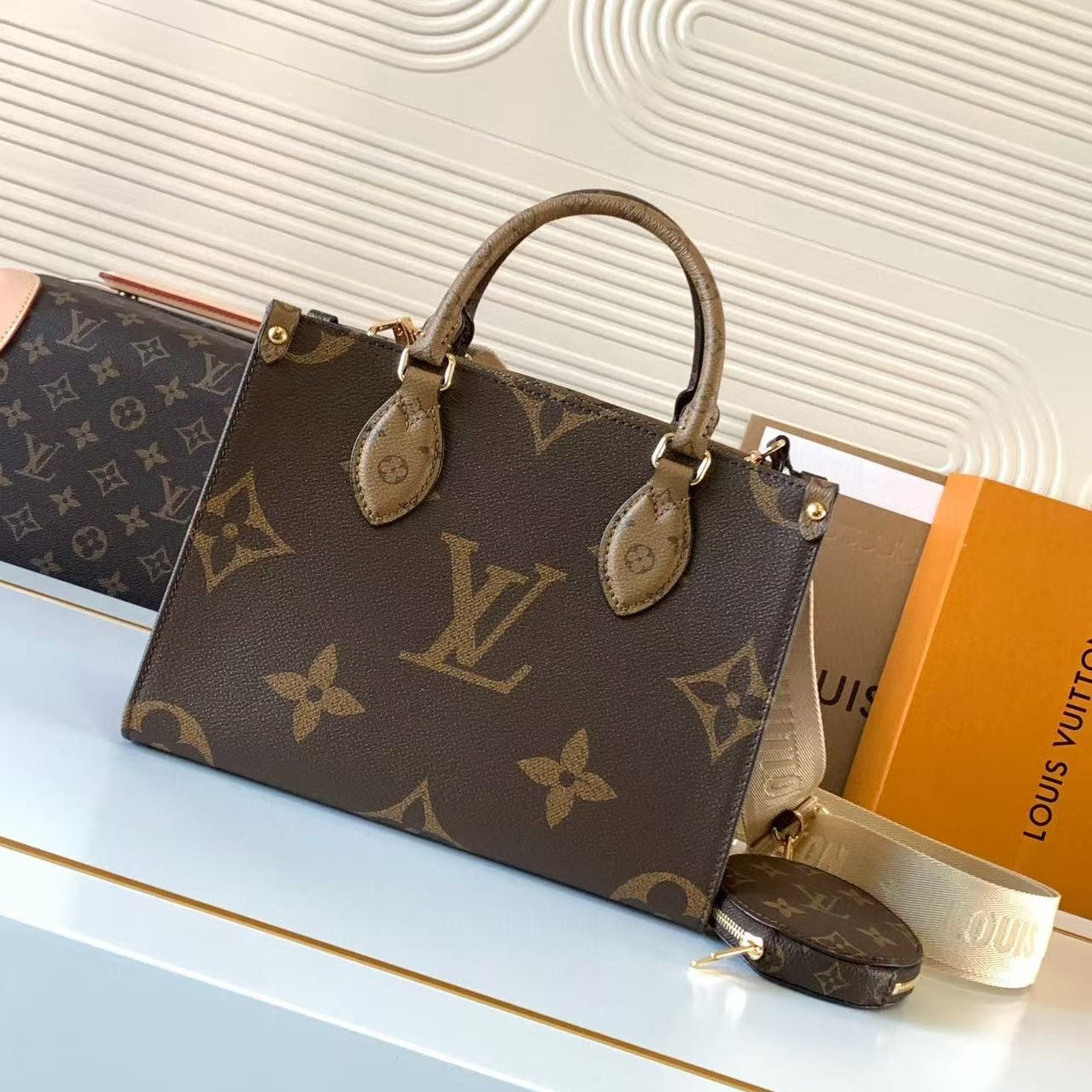 LV OnTheGo PM Brown Monogram and Monogram Reverse Coated Canvas
