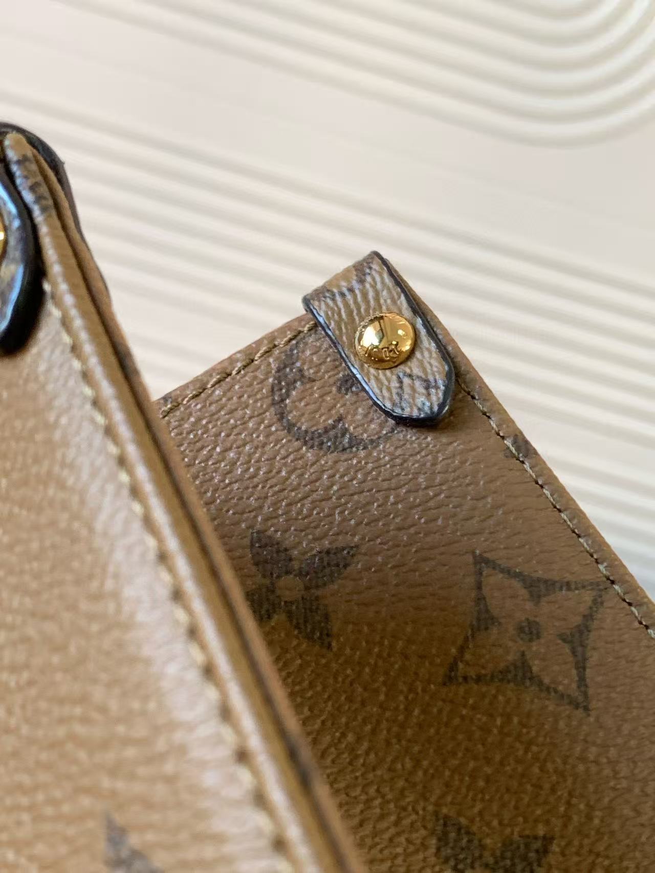 LV OnTheGo PM Brown Monogram and Monogram Reverse Coated Canvas