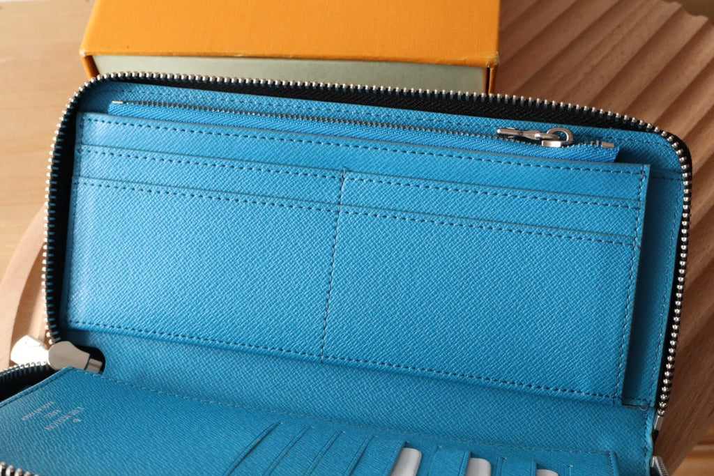 LV Zippy Vertical Wallet Light Blue Monogram Canvas & Taïga Leather 180051