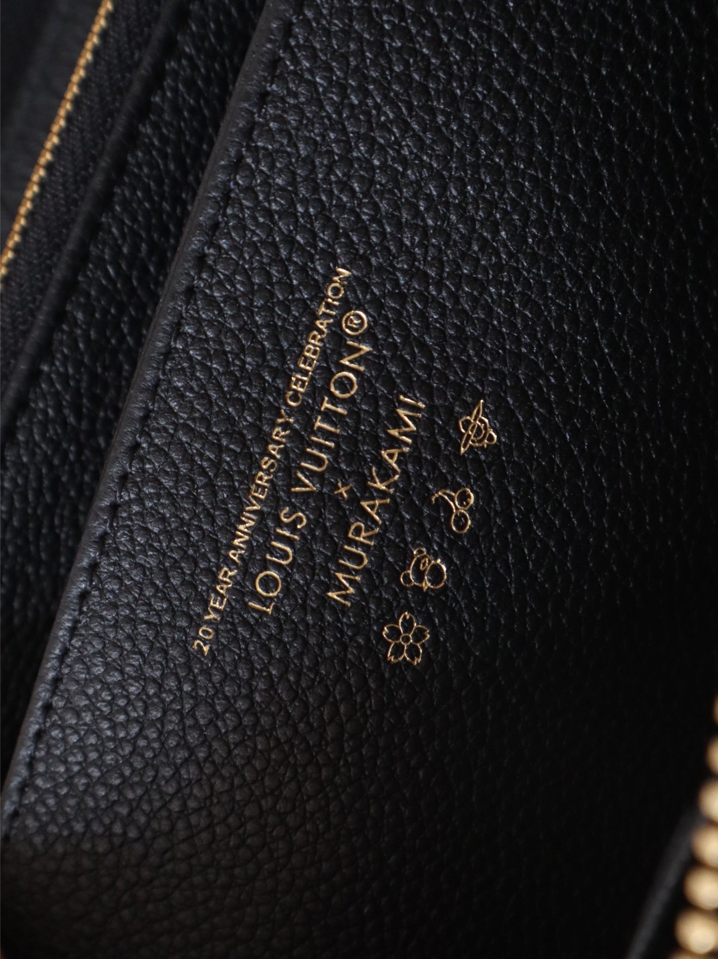 LV × TM Zippy Wallet Panda Black Monogram-embossed Cowhide